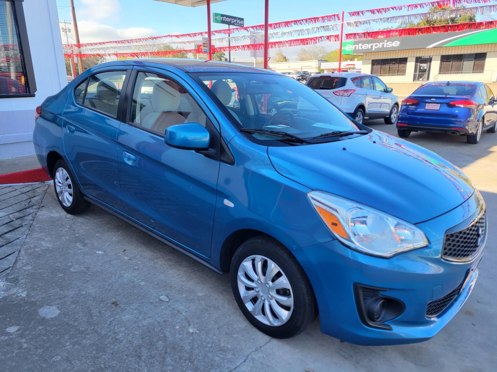 2020 Blue Mitsubishi Mirage G4 (ML32F3FJ1LH) with an 1.2L I3 F DOHC 12V engine, Automatic transmission, located at 503 West Court, Seguin, TX, 78155, (830) 379-3373, 29.568621, -97.969803 - Photo #1